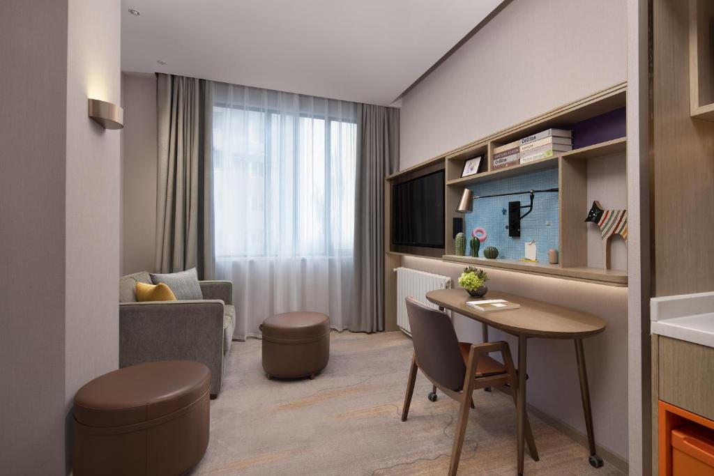 Posezení v ubytování Home2 Suites By Hilton Wuhan Hankou Railway Station