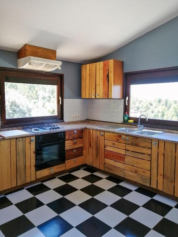Kuchyň nebo kuchyňský kout v ubytování Mas de Pau - Boutique Apartments
