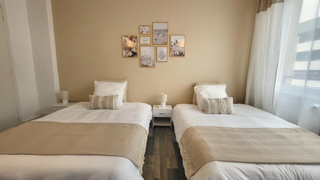 Posteľ alebo postele v izbe v ubytovaní Logement spacieux - Face à la gare et centre-ville