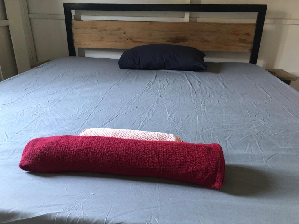 Postel nebo postele na pokoji v ubytování Macondo Mpai bay
