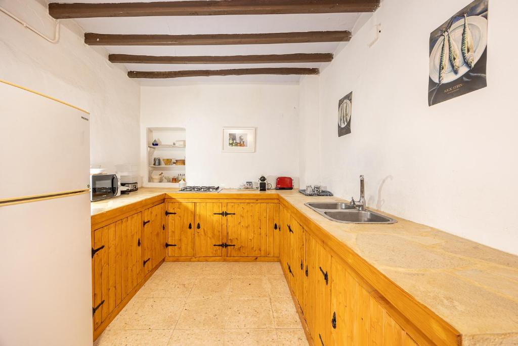 Kuchyň nebo kuchyňský kout v ubytování Casa Rural La Clau