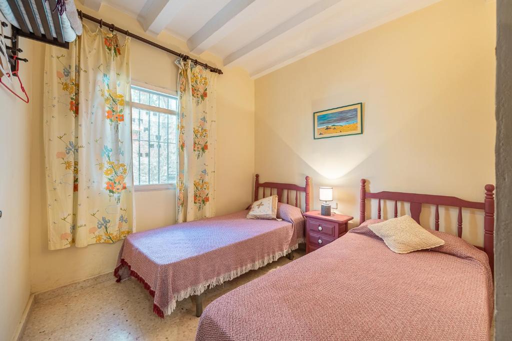 Postel nebo postele na pokoji v ubytování Casa Rural La Clau
