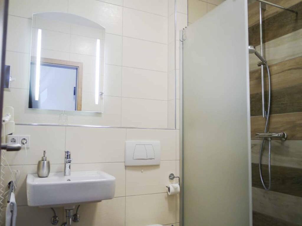 Koupelna v ubytování Da`Sporrer Hotel & Wirtshaus