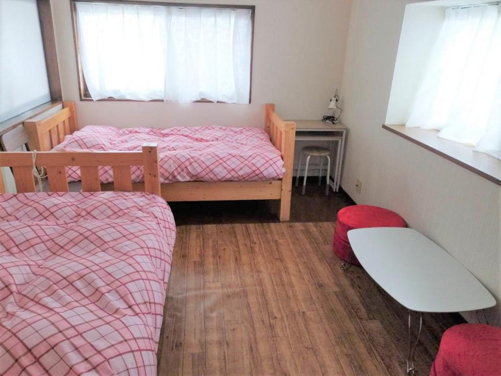 Postel nebo postele na pokoji v ubytování Guest House Asora