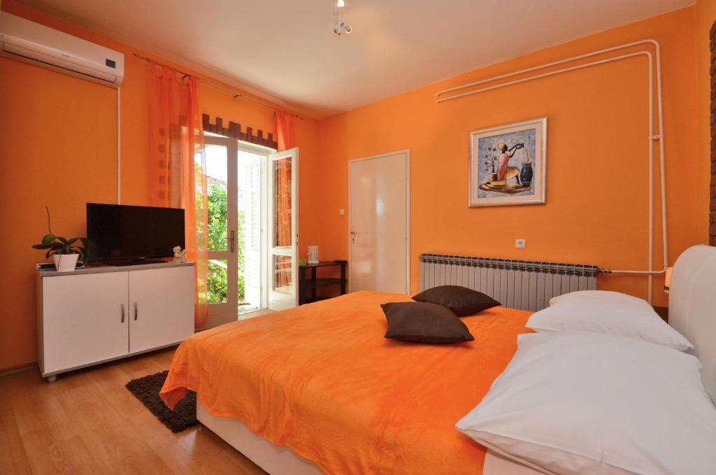 Posteľ alebo postele v izbe v ubytovaní LaidBack Apartments