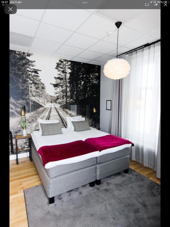 Postel nebo postele na pokoji v ubytování Livin Station Hotel