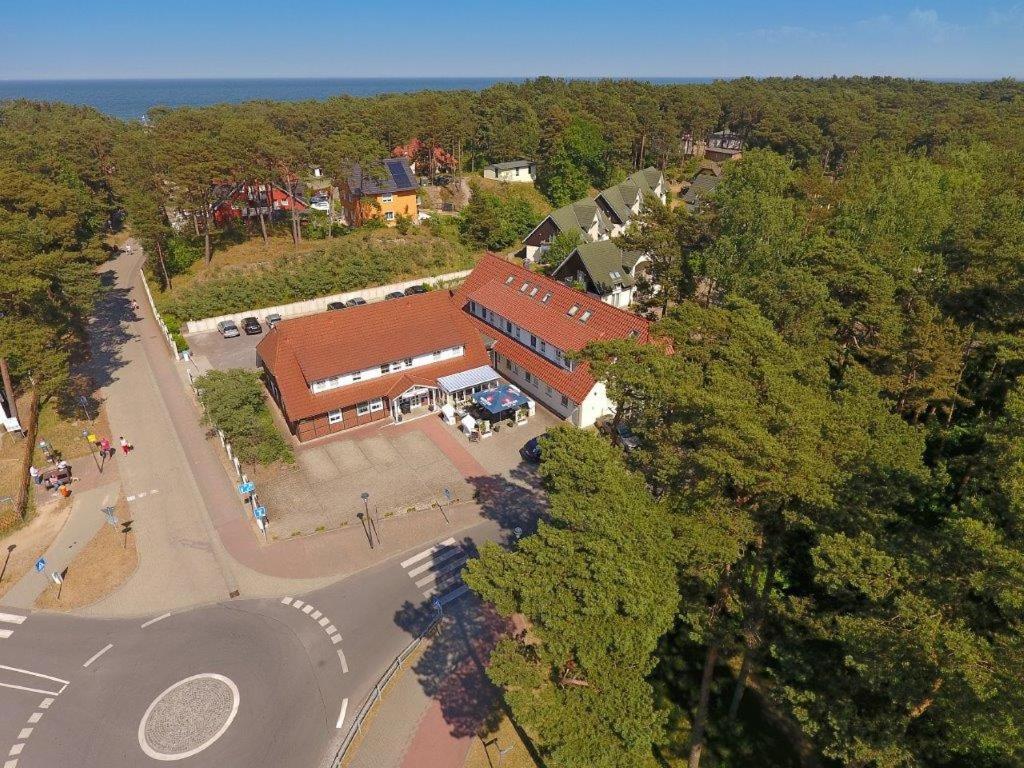 an overhead view of a church with a building at Strandhotel Sanddorn in Trassenheide