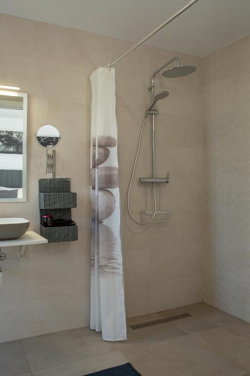 Koupelna v ubytování Apartamentos Aponiente
