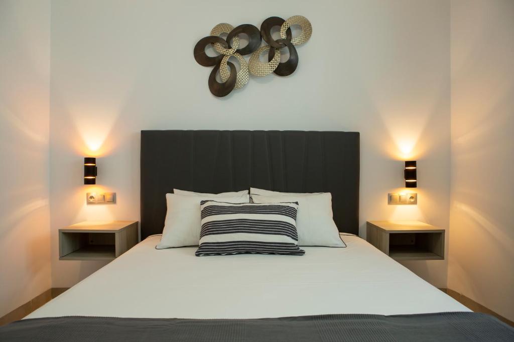 Postel nebo postele na pokoji v ubytování Apartamentos Aponiente