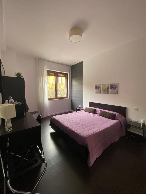 Postel nebo postele na pokoji v ubytování Domus Corso Umberto 18 B&B