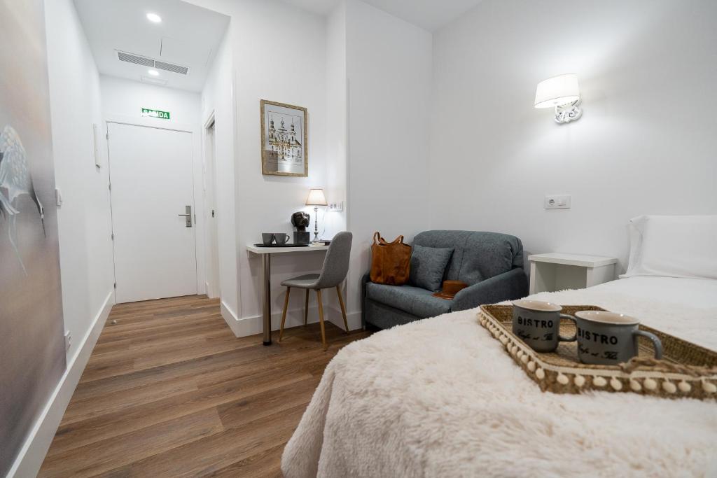 Ένα ή περισσότερα κρεβάτια σε δωμάτιο στο Center Suite Acebedos
