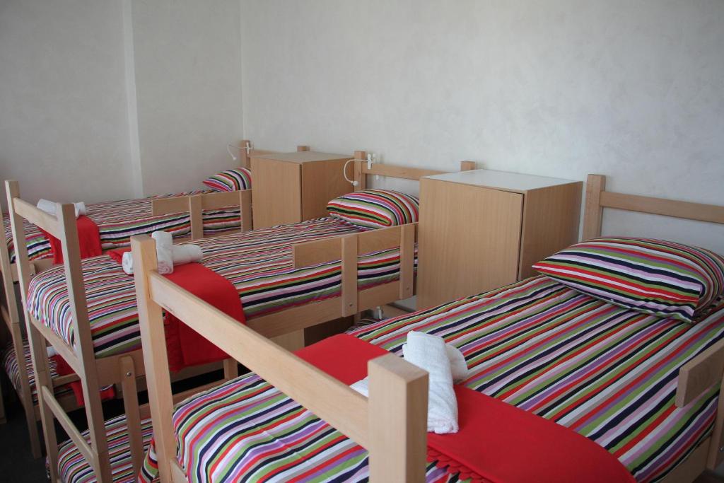 Postel nebo postele na pokoji v ubytování Guest House Miss Depolo