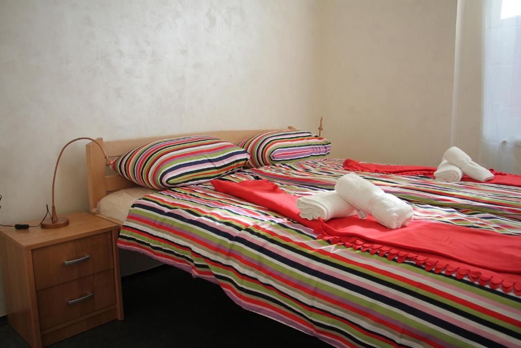 Postel nebo postele na pokoji v ubytování Guest House Miss Depolo