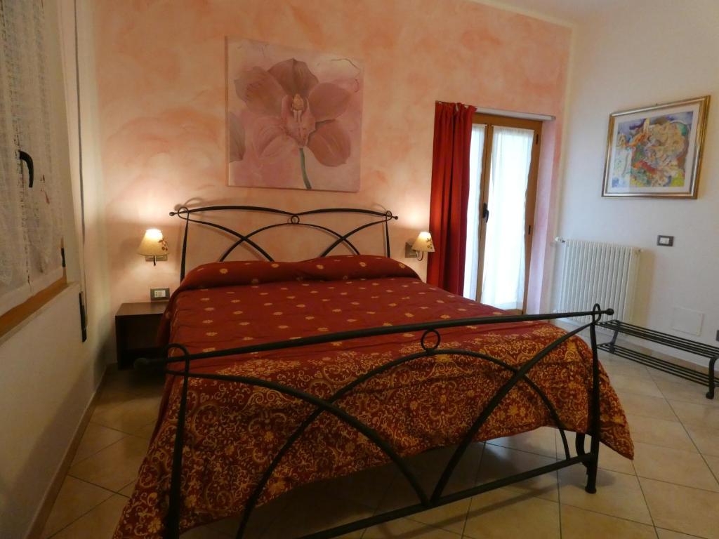 Postel nebo postele na pokoji v ubytování Guest house Il Giardino in Città