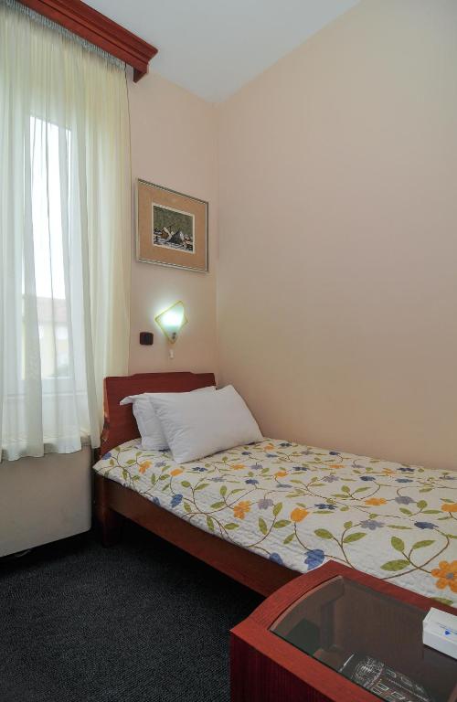 Krevet ili kreveti u jedinici u okviru objekta Hotel Montenegrino