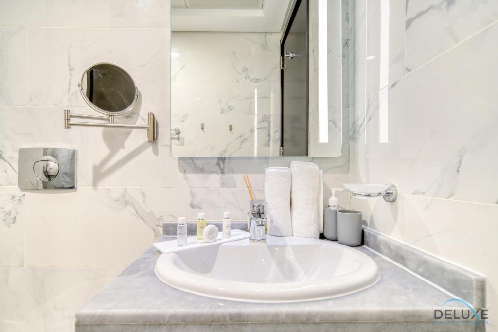 Koupelna v ubytování Classic 1BR at MAG 510 Dubai South by Deluxe Holiday Homes