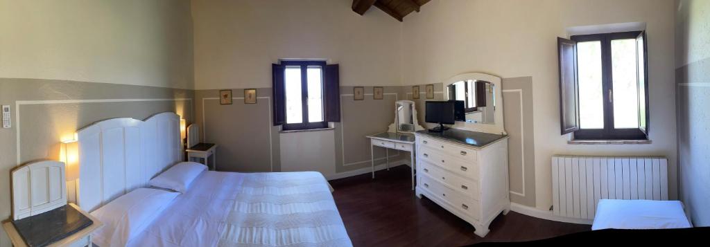 Posteľ alebo postele v izbe v ubytovaní Country House Le Case Coloniche