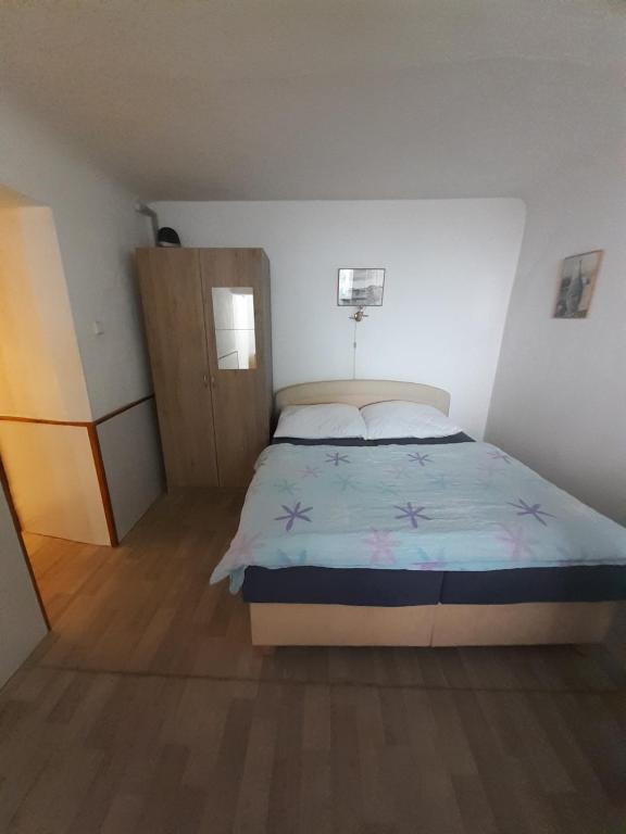 Letto o letti in una camera di Penzion Fontána