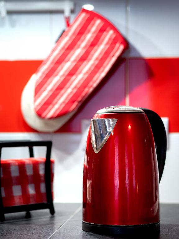 A seating area at Colors Apartment