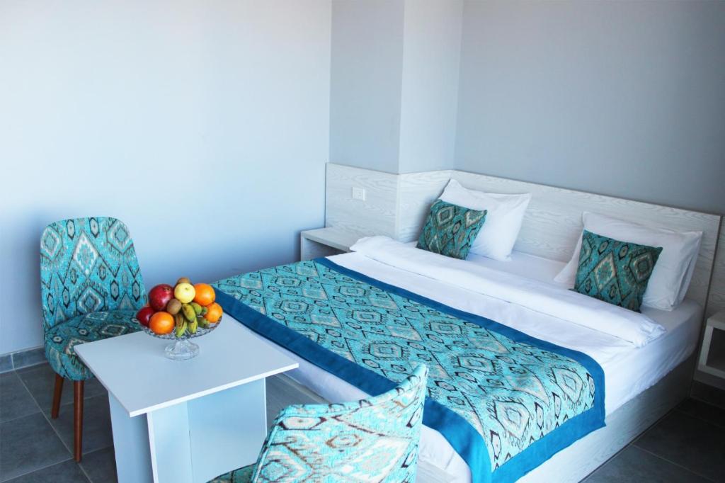 Кровать или кровати в номере Shellghada Blue Beach