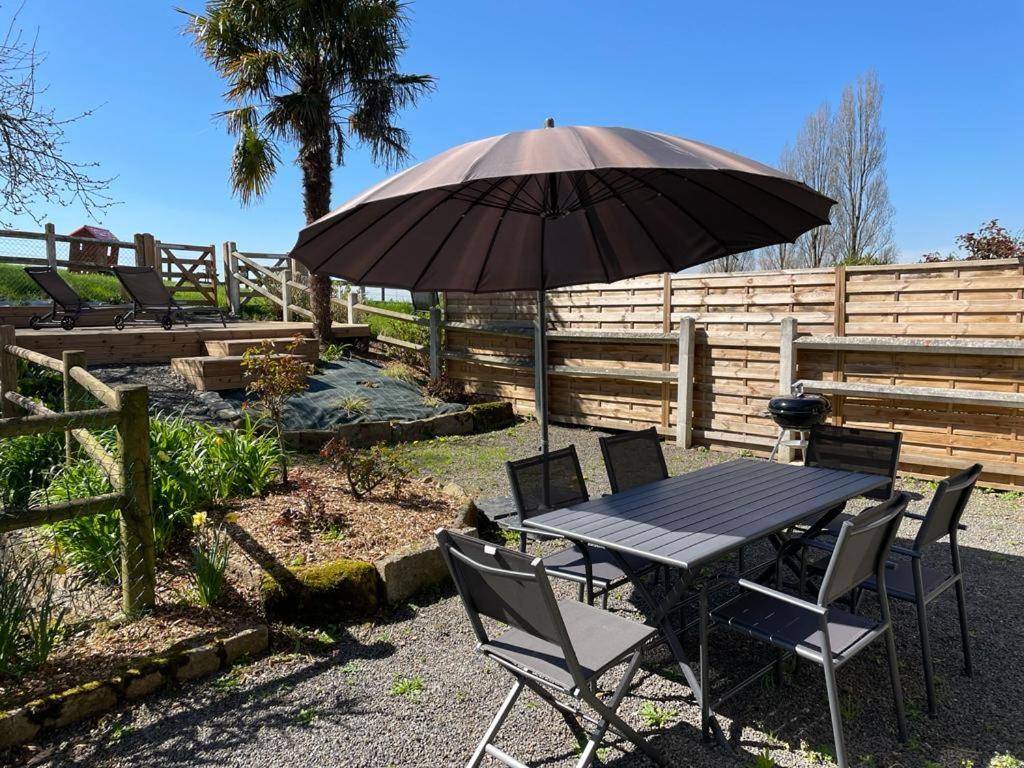 Zahrada ubytování Maison chaleureuse avec terrasse et vue baie