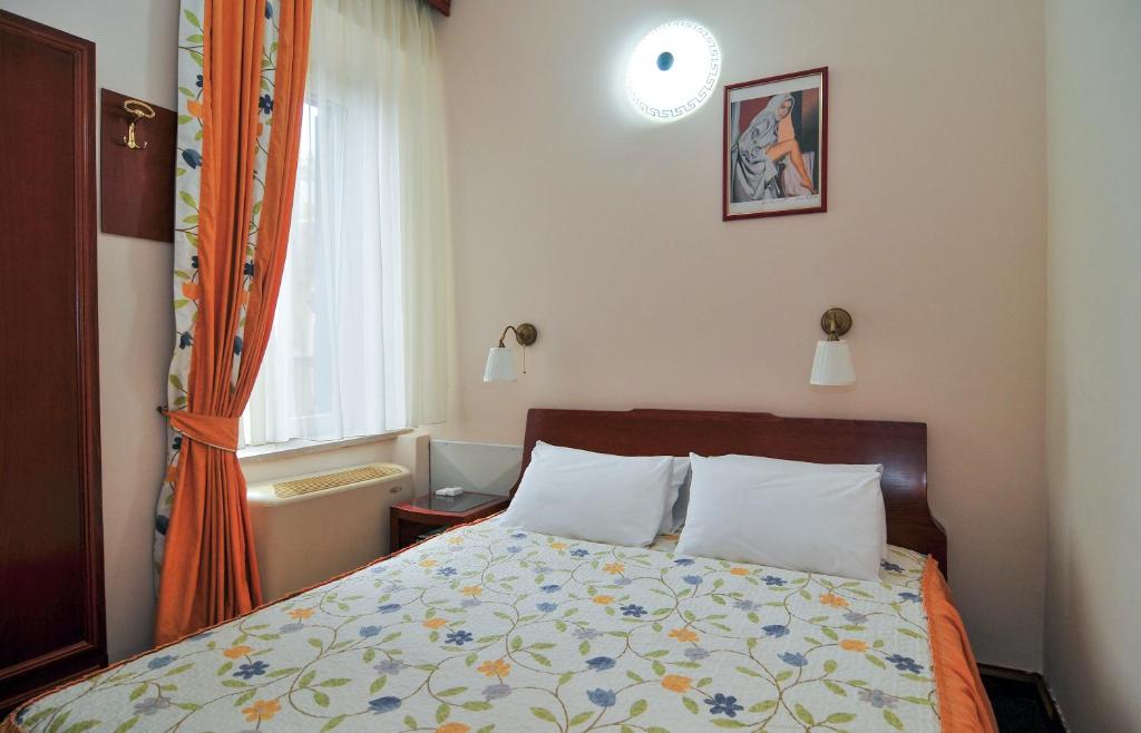 Krevet ili kreveti u jedinici u okviru objekta Hotel Montenegrino