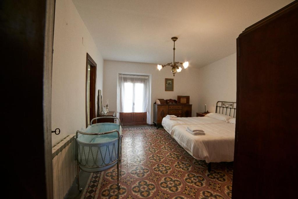 Postel nebo postele na pokoji v ubytování Casona Alcarria