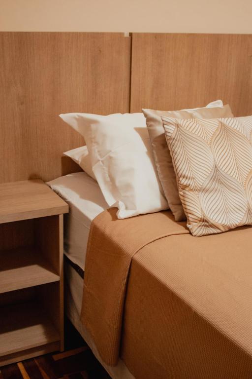 Quarto Triplo com Banheiro Privativo