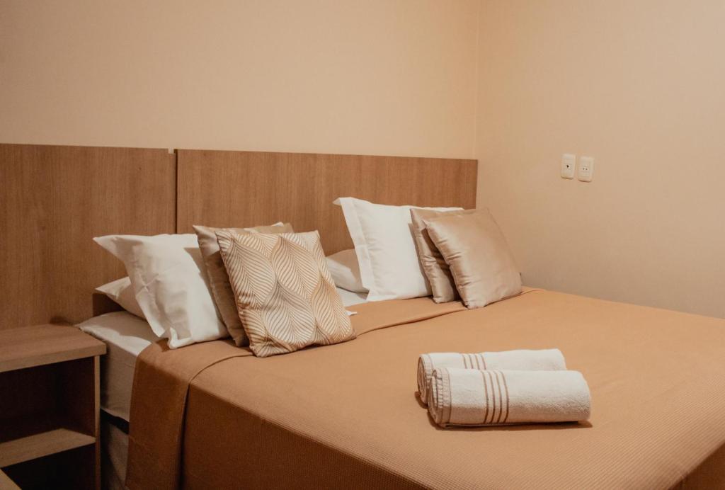 Quarto Triplo com Banheiro Privativo