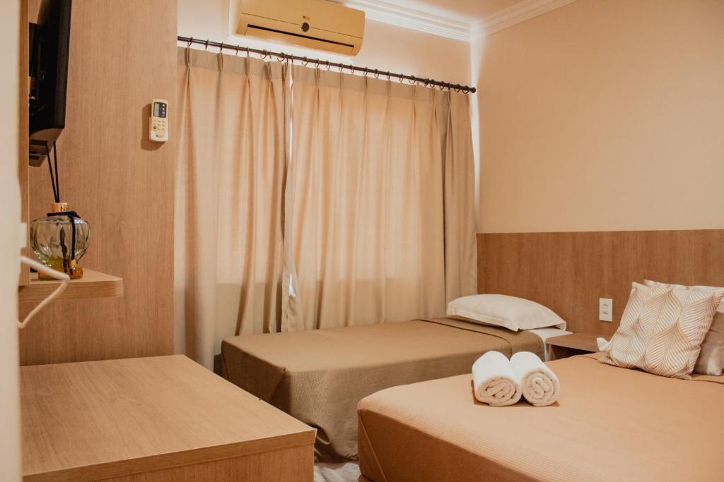 Quarto Triplo com Banheiro Privativo