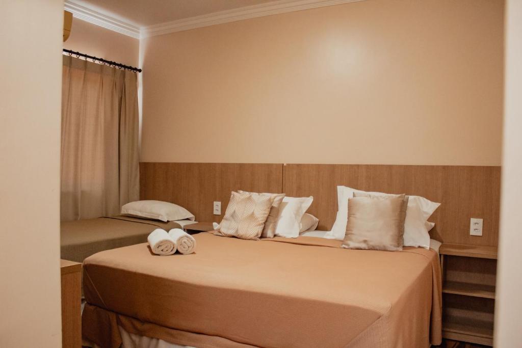 Quarto Triplo com Banheiro Privativo