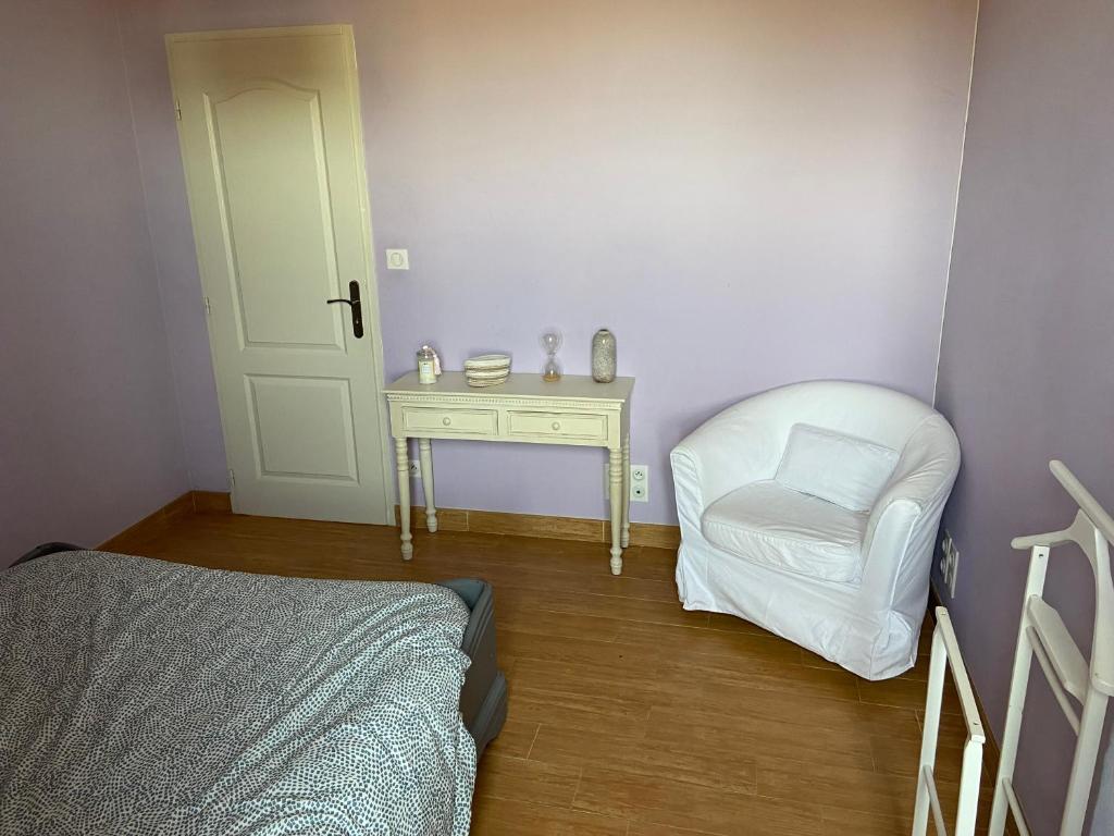Posteľ alebo postele v izbe v ubytovaní Notre petite maison dans la prairie