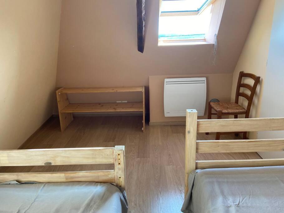 Posteľ alebo postele v izbe v ubytovaní Notre petite maison dans la prairie