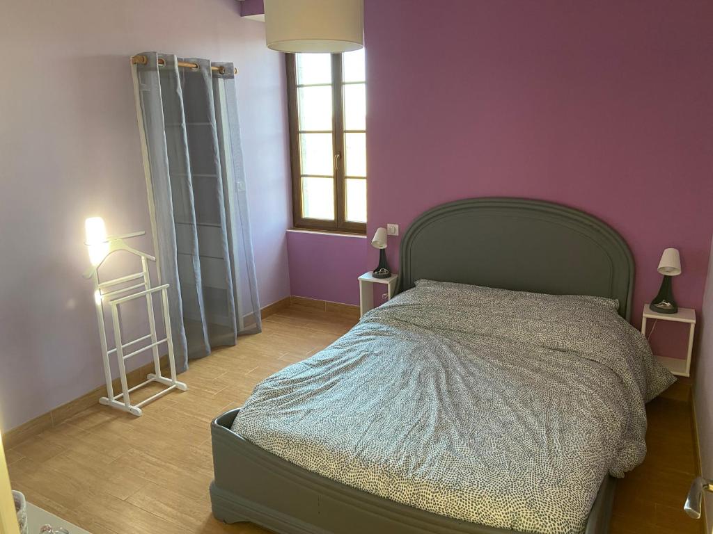 Posteľ alebo postele v izbe v ubytovaní Notre petite maison dans la prairie