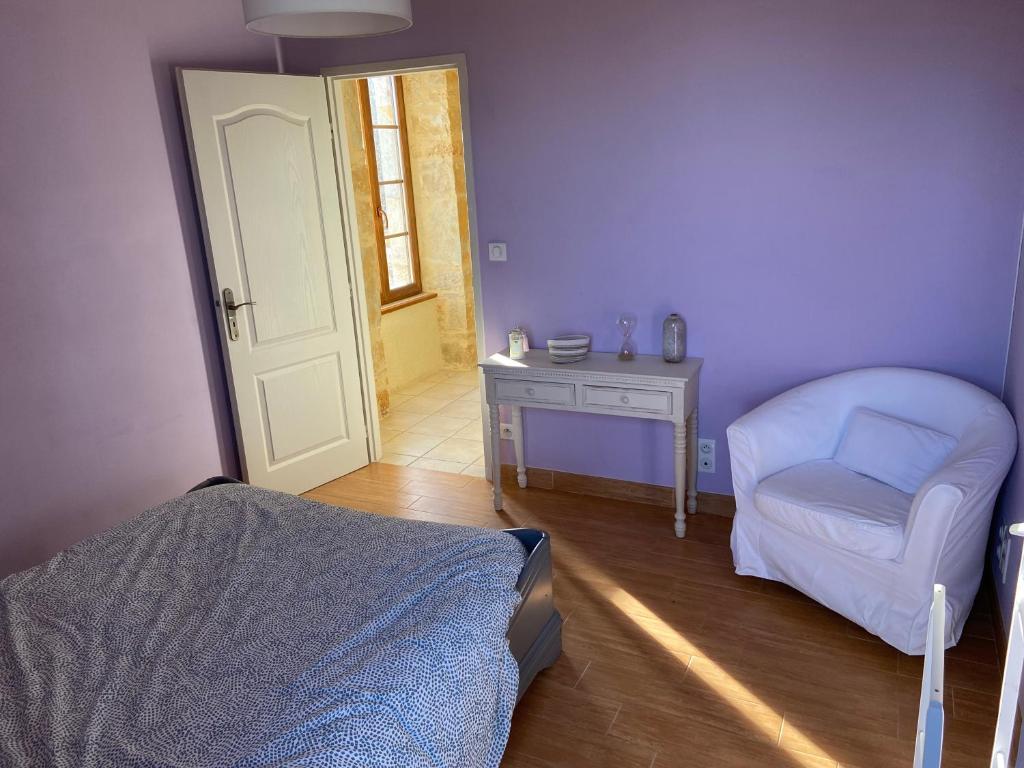 Posteľ alebo postele v izbe v ubytovaní Notre petite maison dans la prairie