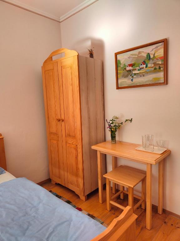 Postel nebo postele na pokoji v ubytování Ethno&Coffee House Tulip
