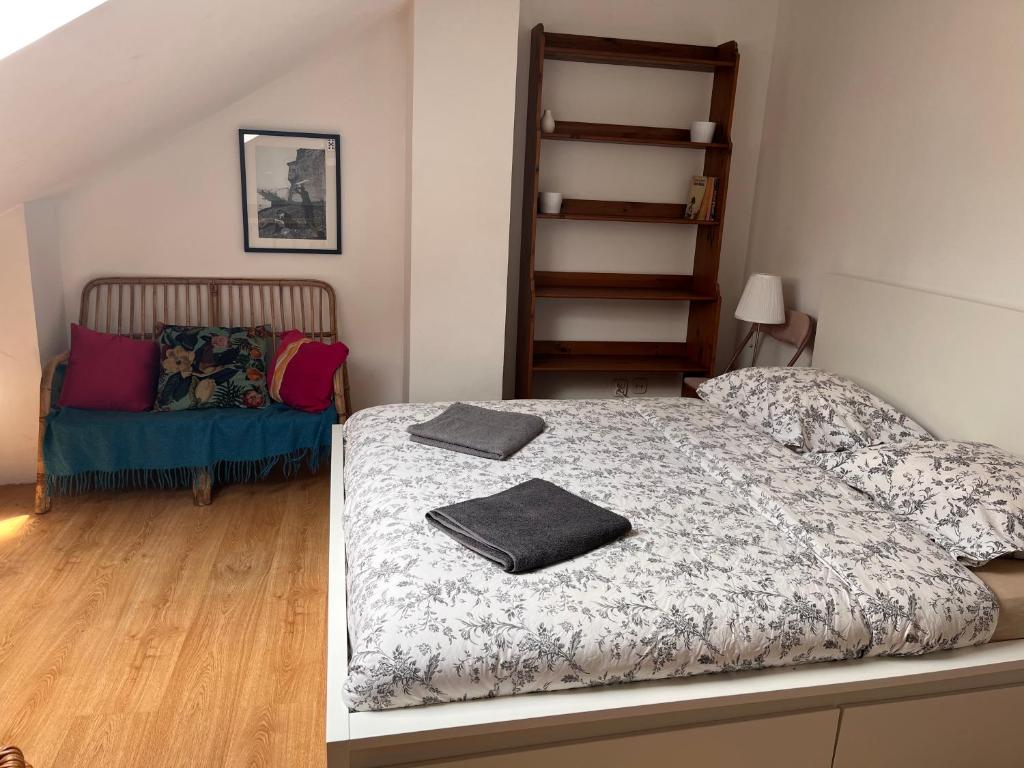 Posteľ alebo postele v izbe v ubytovaní Appartement Vieille Ville