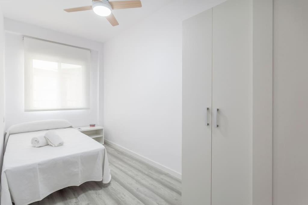 Postel nebo postele na pokoji v ubytování Fantástico apartamento junto al mar