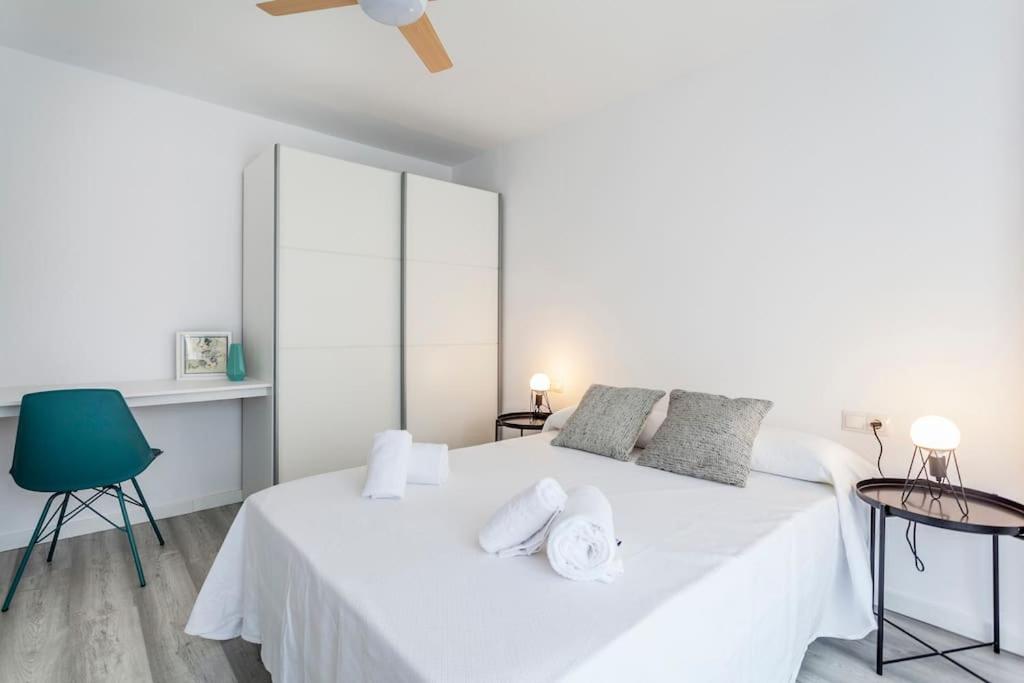 Postel nebo postele na pokoji v ubytování Fantástico apartamento junto al mar