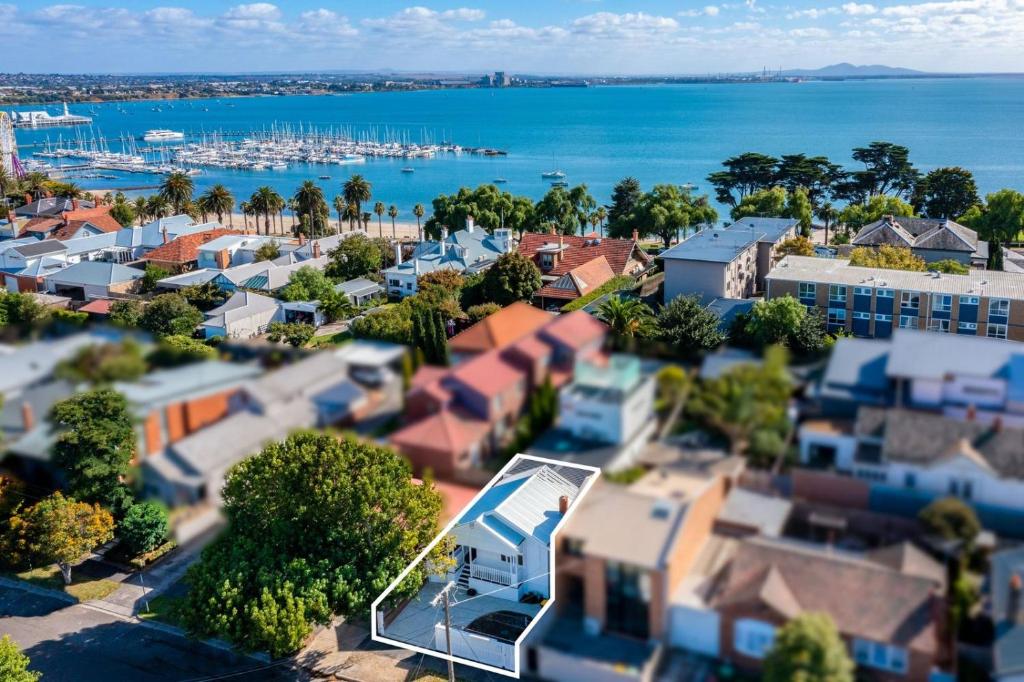 an aerial view of a city with a harbor at Eastern Beach Retreat in Geelong