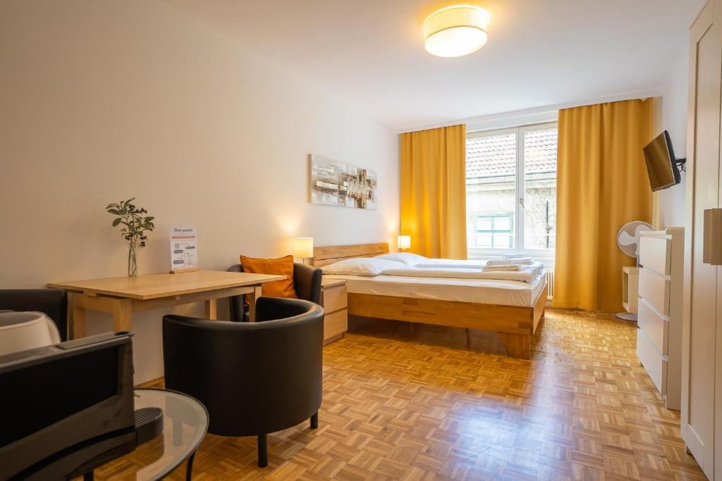 Una cama o camas en una habitación de Central living - Stephansdom Apartments