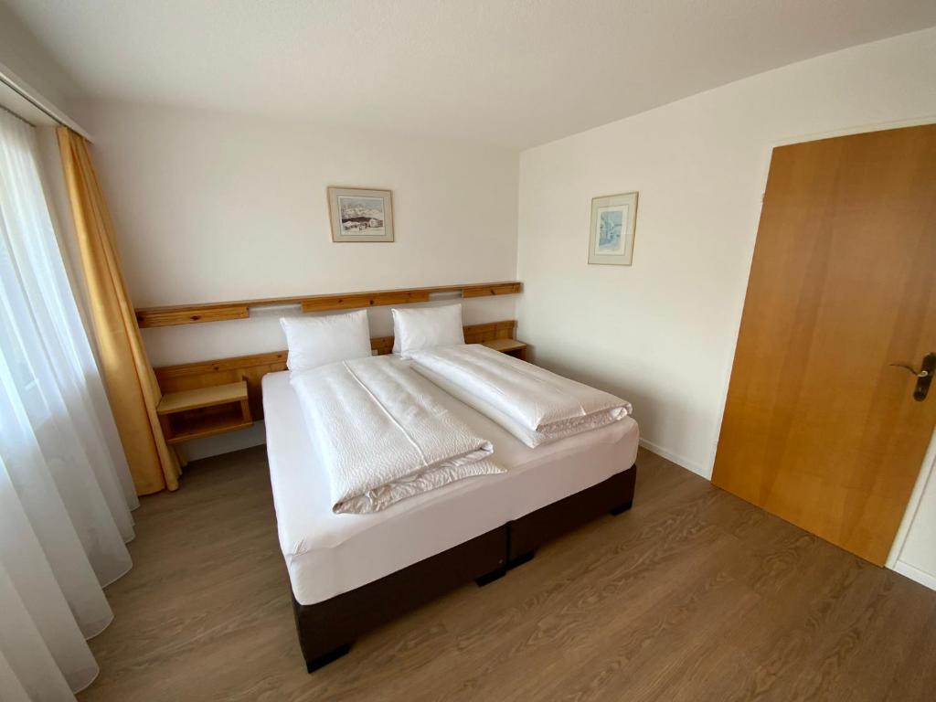 Postel nebo postele na pokoji v ubytování Alfa Appartements Superior