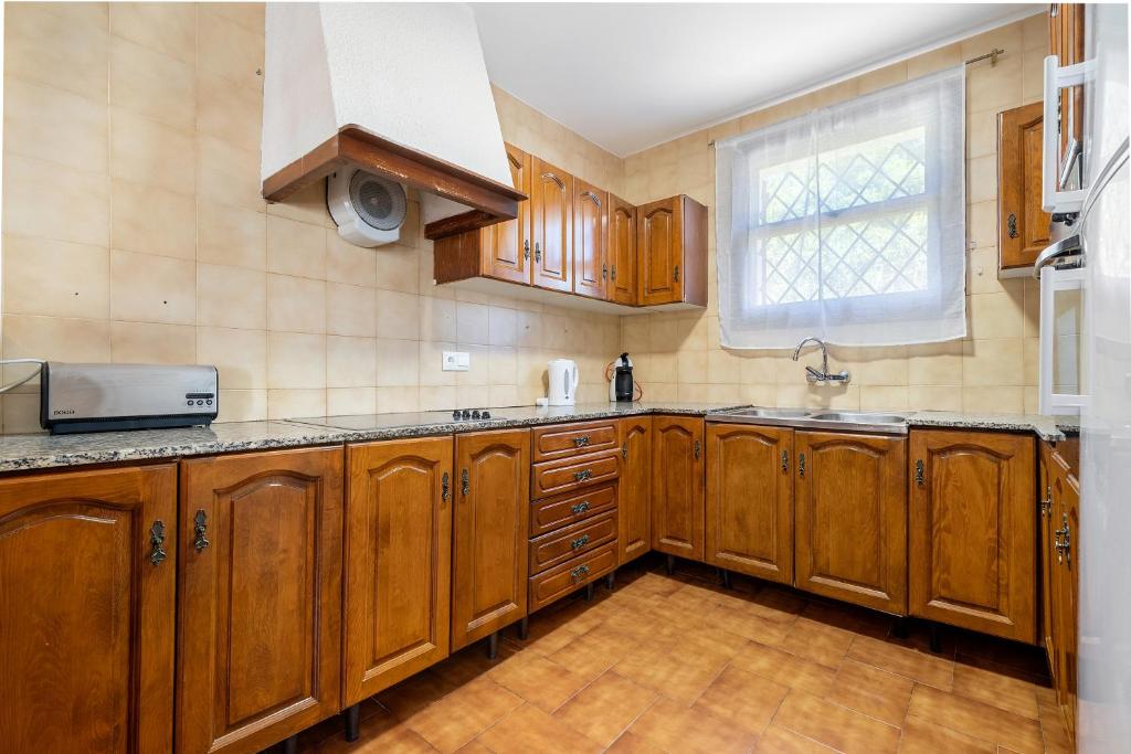 Kuchyňa alebo kuchynka v ubytovaní Hauzify I Casa l'Estany