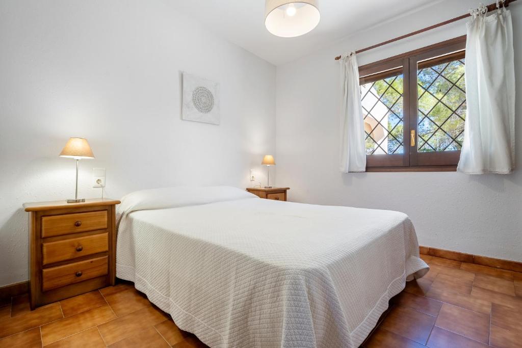 Posteľ alebo postele v izbe v ubytovaní Hauzify I Casa l'Estany