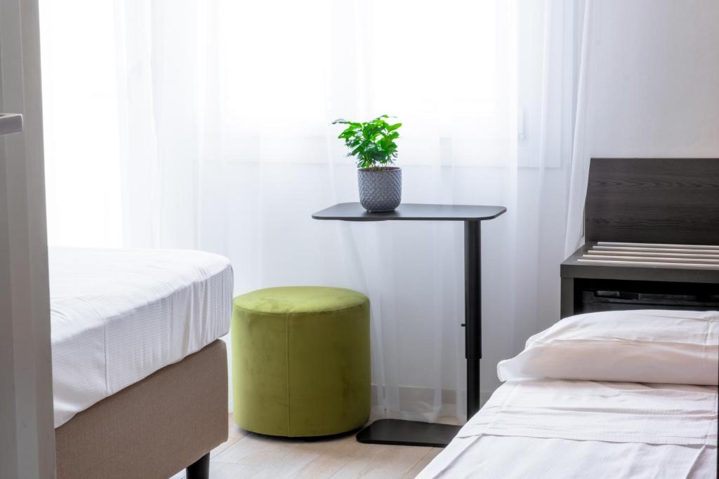Posteľ alebo postele v izbe v ubytovaní Lilium Maris Hotel