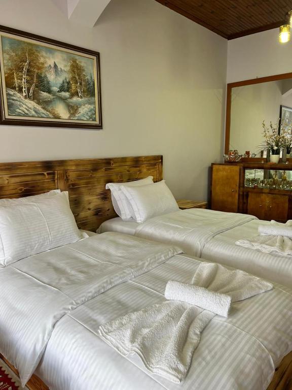 Voodi või voodid majutusasutuse Guesthouse Hoxha toas