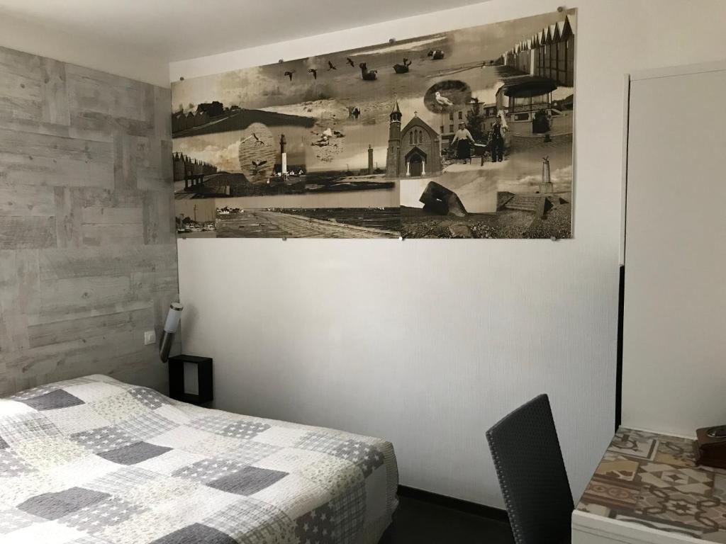 Postel nebo postele na pokoji v ubytování Logis - Le Neptune Hôtel & Restaurant