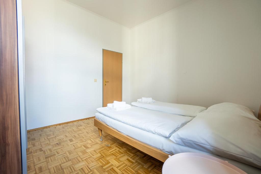 A bed or beds in a room at Two bedrooms family nice apartment