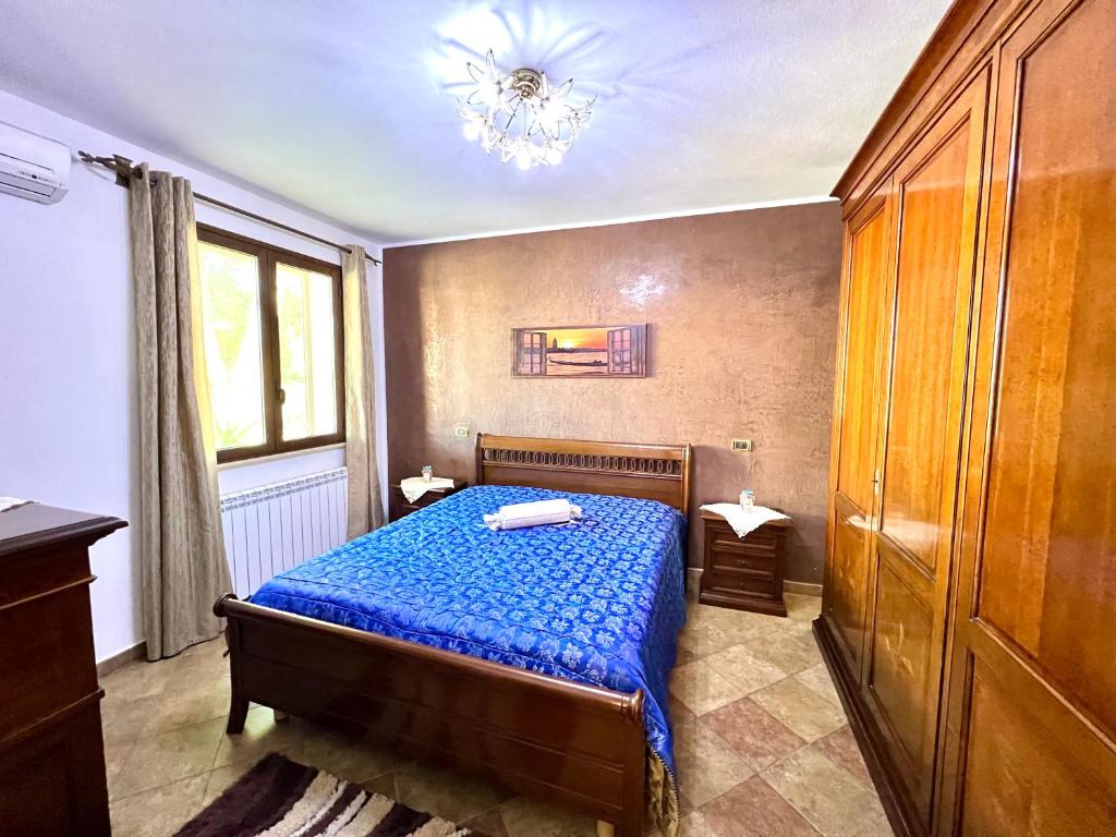Postel nebo postele na pokoji v ubytování La Cinisara