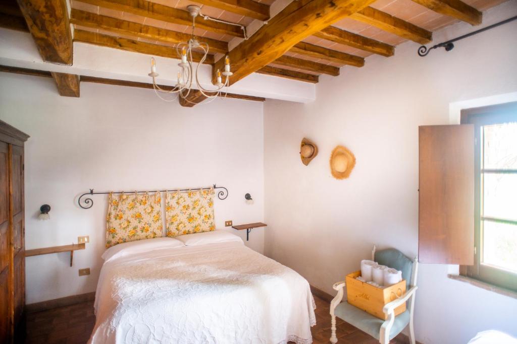 Postel nebo postele na pokoji v ubytování Agriturismo Pieve Sprenna